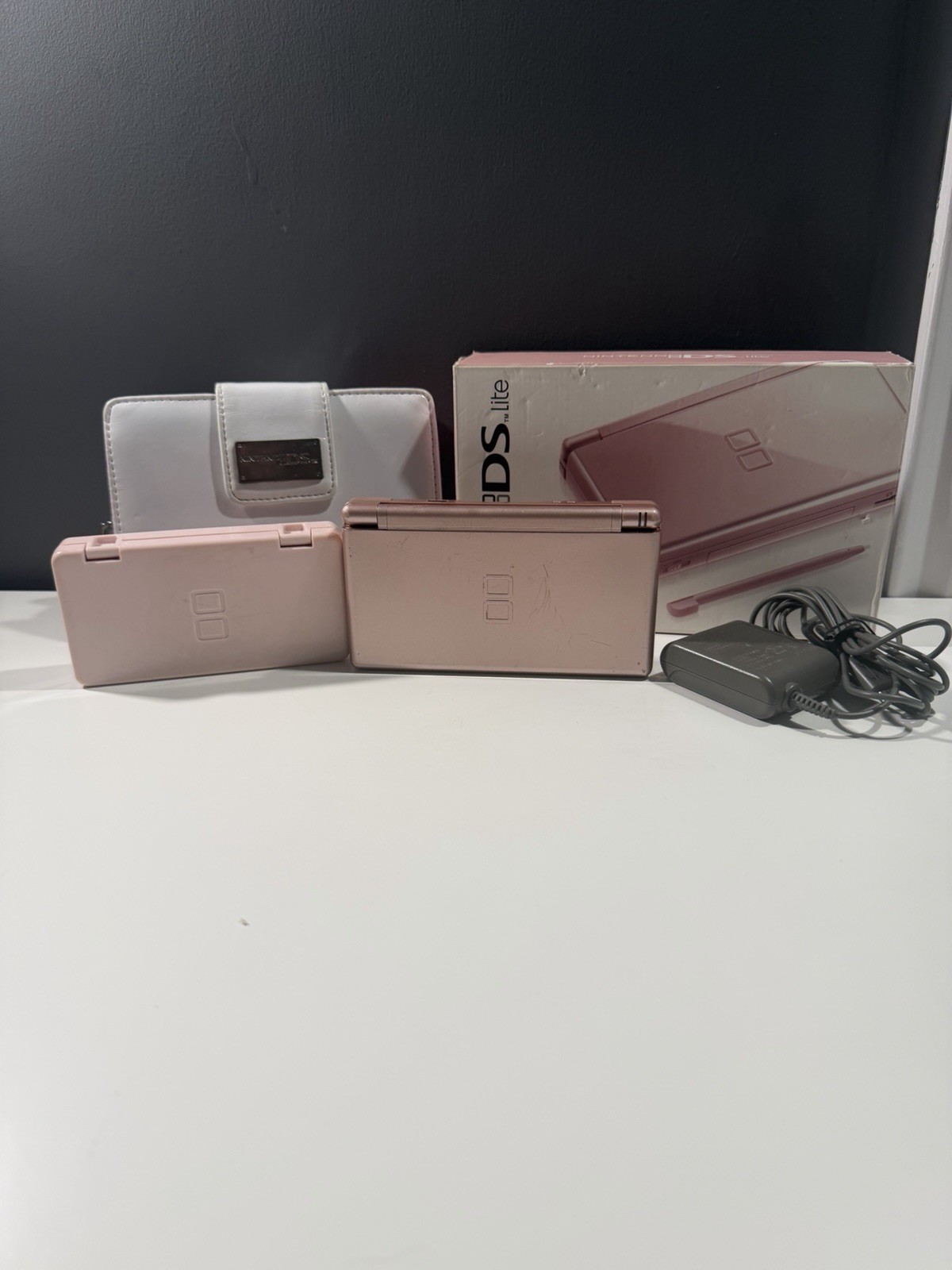 Nintendo DS Lite Metallic Rose System With Charger, Original Box, And 2 Cases