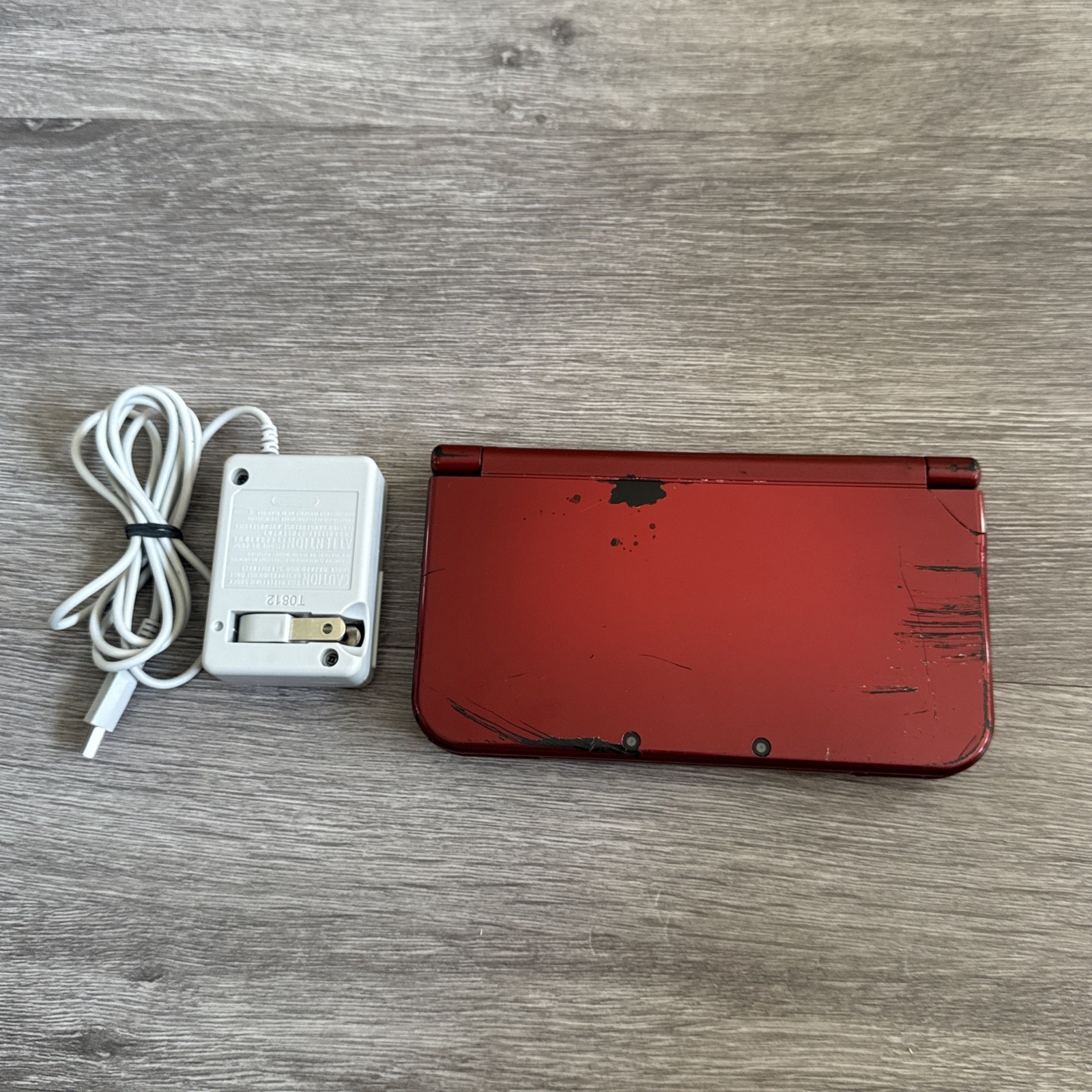 Nintendo New 3DS XL Console With Charger Red. Cosmetic Damage Tested And Working
