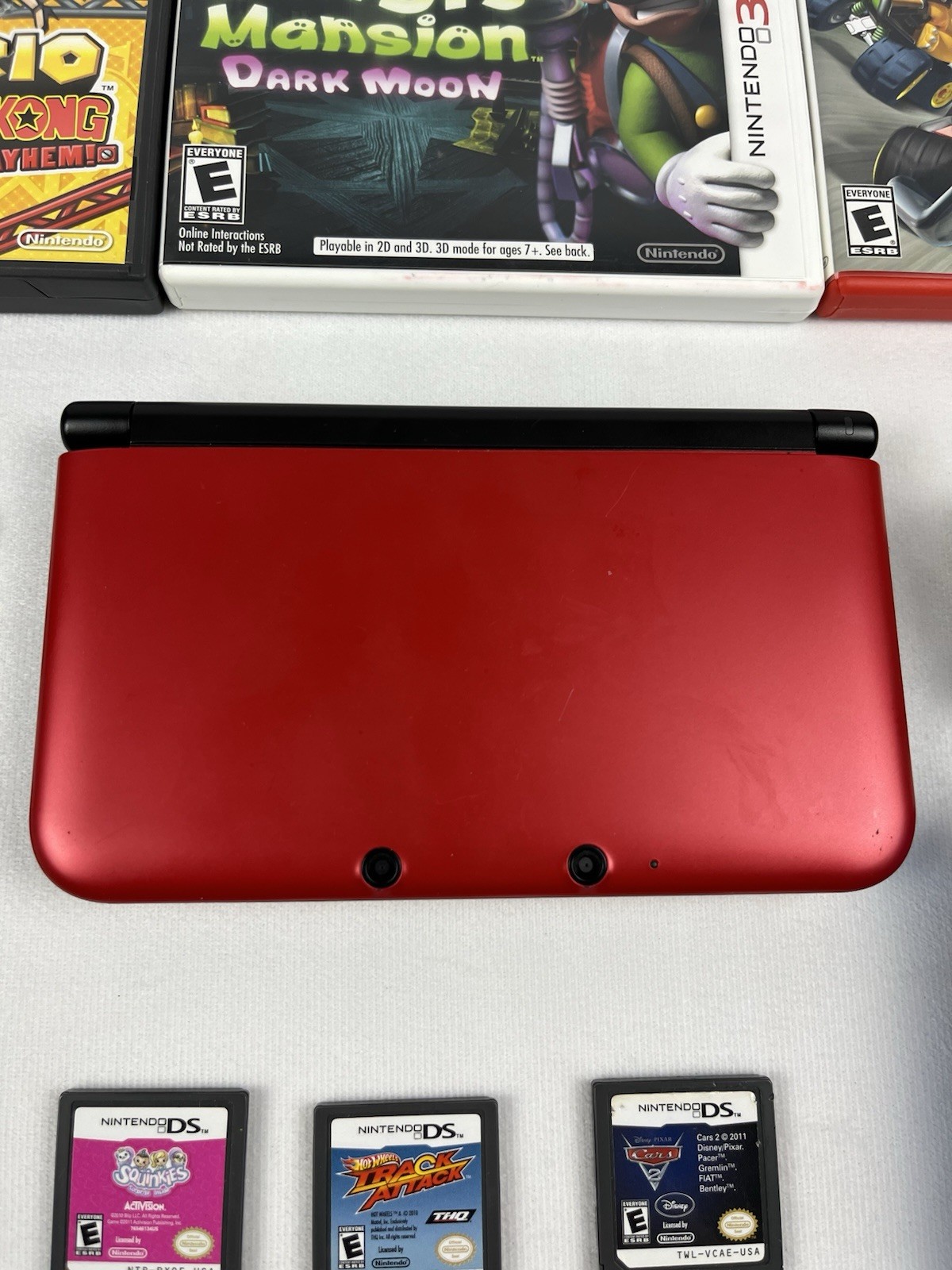 Nintendo 3DS XL Red Bundle w/ Charger, Stylus, SD Card, and 15 DS/3DS Games