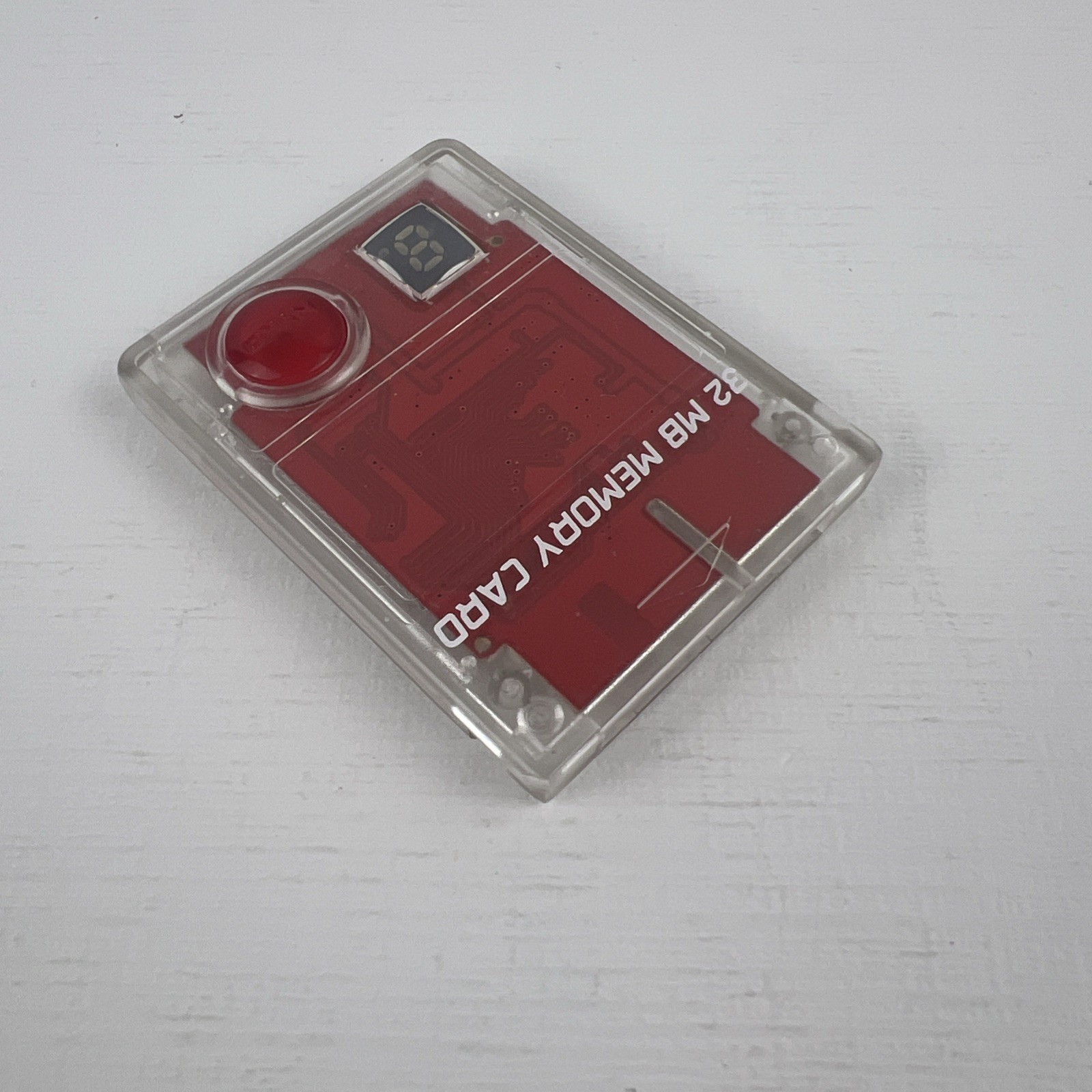 Nyko 32MB Memory Card for Sony Playstation 2, Clear/ Red PS2 Item# 80599-F09