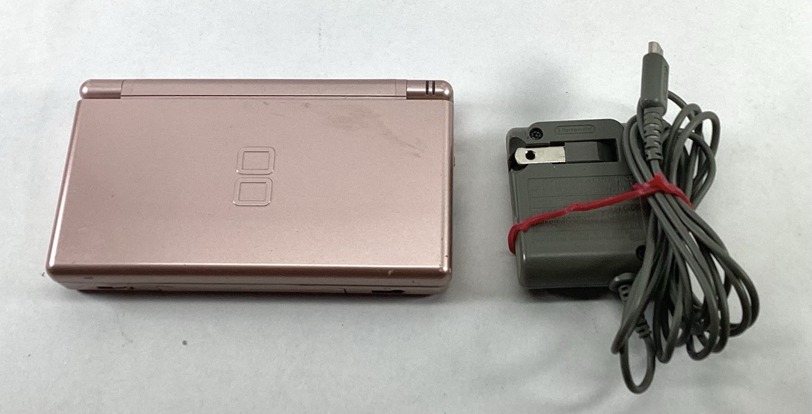 Nintendo DS Lite USG-001 Rose Pink OEM Charger UG-002 Stylus W/Scratches Tested